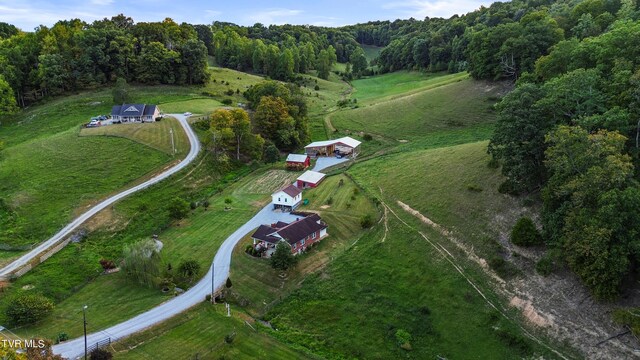 birds eye view of property featuring a rural view