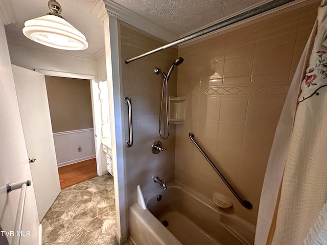 bathroom with a textured ceiling, wood-type flooring, crown molding, and shower / bath combo with shower curtain