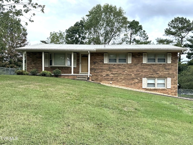 view of front of house with a front lawn