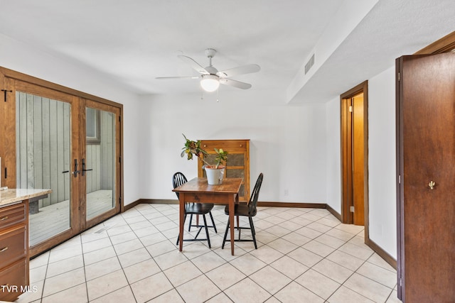 tiled dining room with ceiling fan