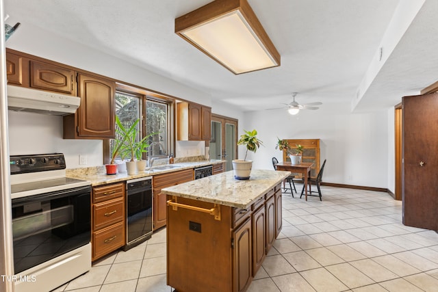 kitchen featuring white electric range oven, a kitchen island, light tile patterned floors, sink, and ceiling fan