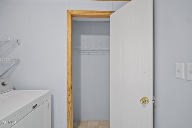 laundry area with washer / dryer