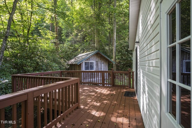 deck featuring a storage unit