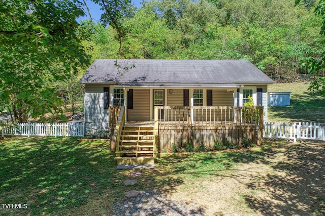 ranch-style home with a front lawn