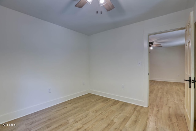 empty room with light hardwood / wood-style flooring and ceiling fan