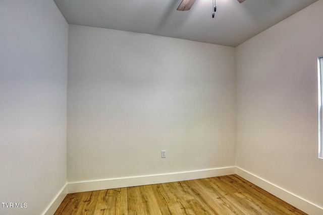 unfurnished room featuring ceiling fan and light hardwood / wood-style floors