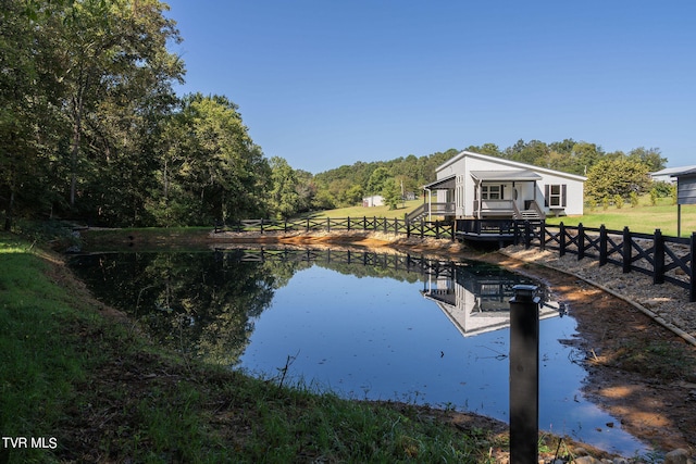 dock area with a water view