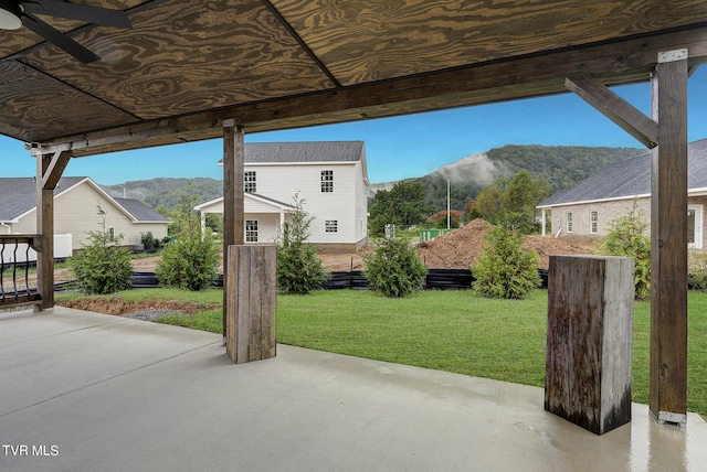 view of patio with a mountain view