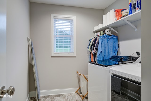 laundry area with independent washer and dryer