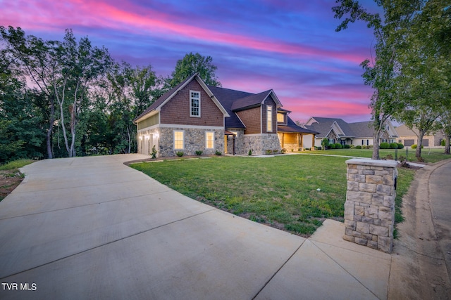 craftsman inspired home featuring a yard