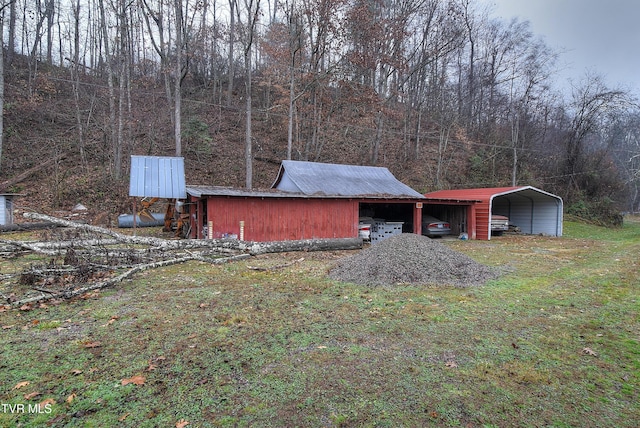 view of outdoor structure with a carport