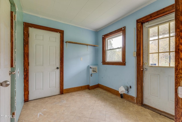 laundry area featuring hookup for a washing machine and ornamental molding