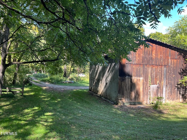 exterior space with a yard