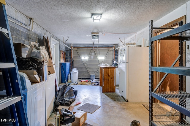 garage featuring white fridge