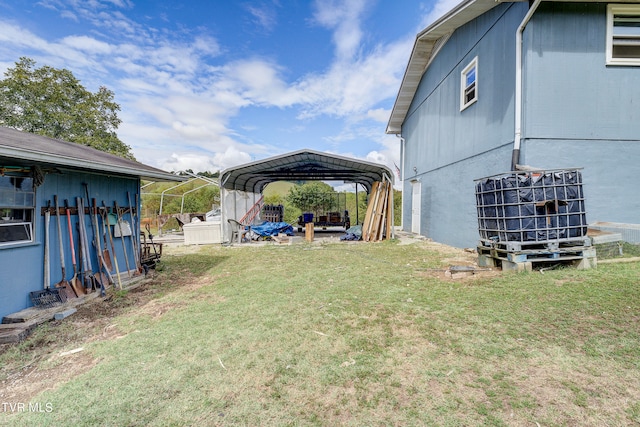 view of yard featuring a carport