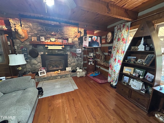 living room featuring hardwood / wood-style floors, beam ceiling, and wood ceiling