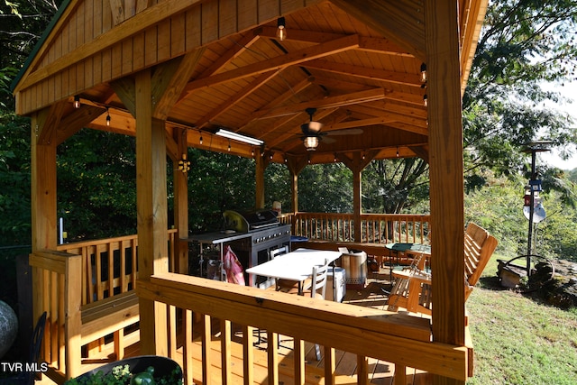 deck with ceiling fan and a gazebo