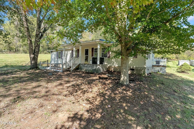 view of front of home with a front lawn