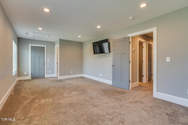 spare room with light colored carpet