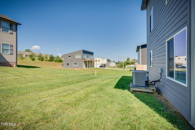 view of yard with central AC