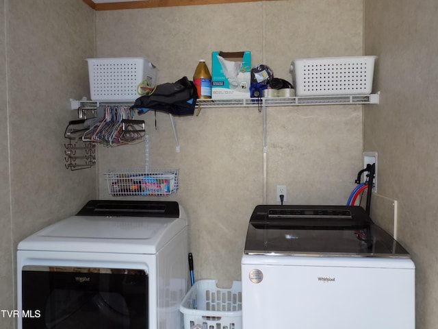 washroom with separate washer and dryer