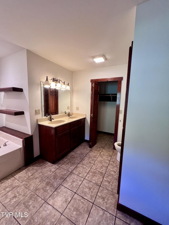 246 Keenburg Rd, Elizabethton, TN 37643 - bathroom featuring tile patterned floors, a garden tub, double vanity, and a sink