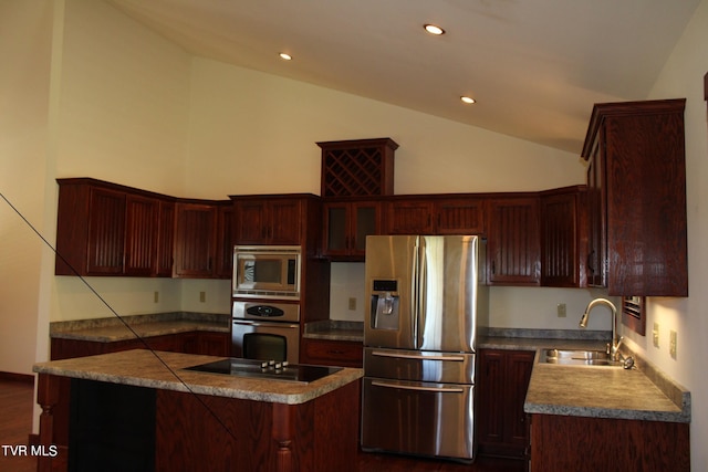 246 Keenburg Rd, Elizabethton, TN 37643 - kitchen featuring dark brown cabinets, recessed lighting, dark wood-style flooring, a sink, and stainless steel appliances