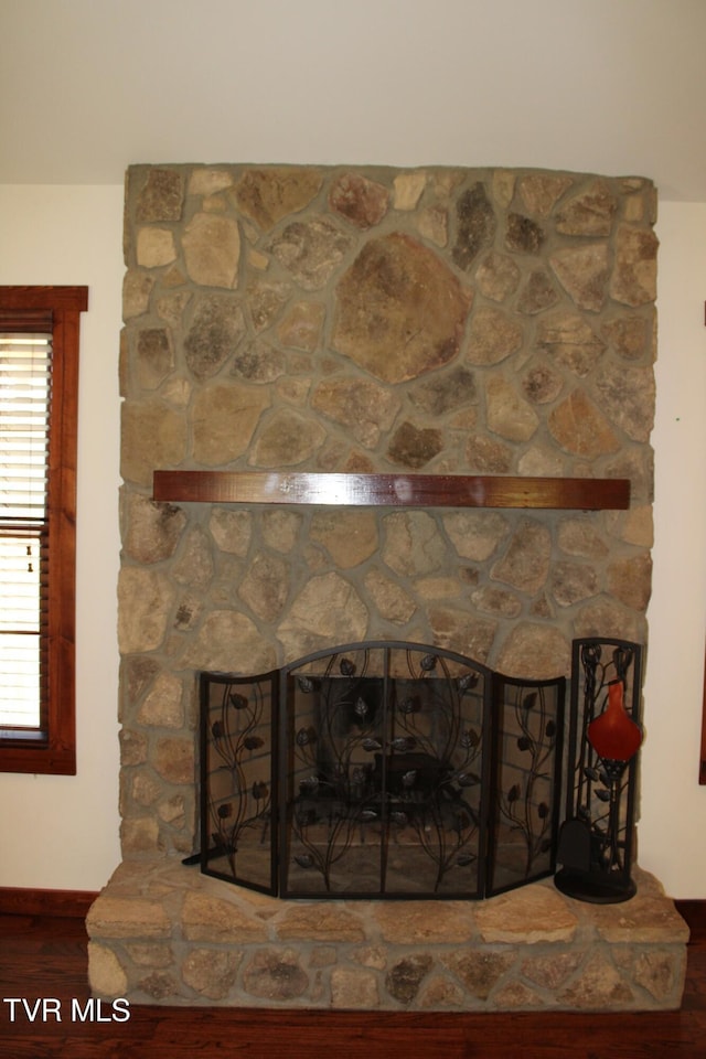 246 Keenburg Rd, Elizabethton, TN 37643 - interior details with wood finished floors, a fireplace, and baseboards