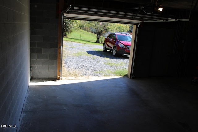 246 Keenburg Rd, Elizabethton, TN 37643 - garage featuring concrete block wall