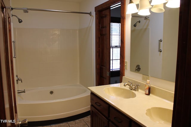 bathroom featuring bathing tub / shower combination, tile patterned flooring, and vanity