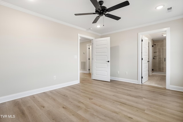 unfurnished bedroom featuring crown molding, ceiling fan, light hardwood / wood-style floors, and ensuite bath