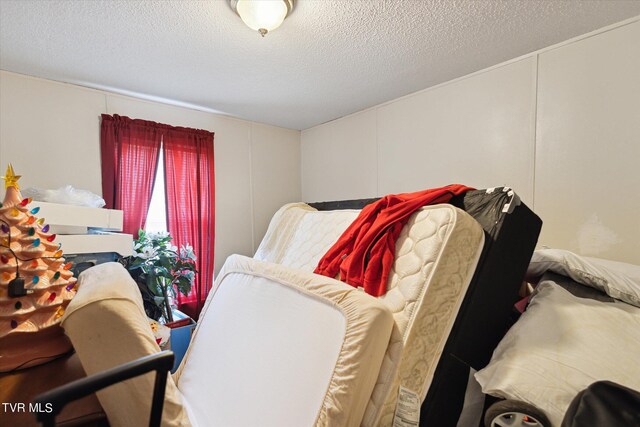 bedroom with a textured ceiling