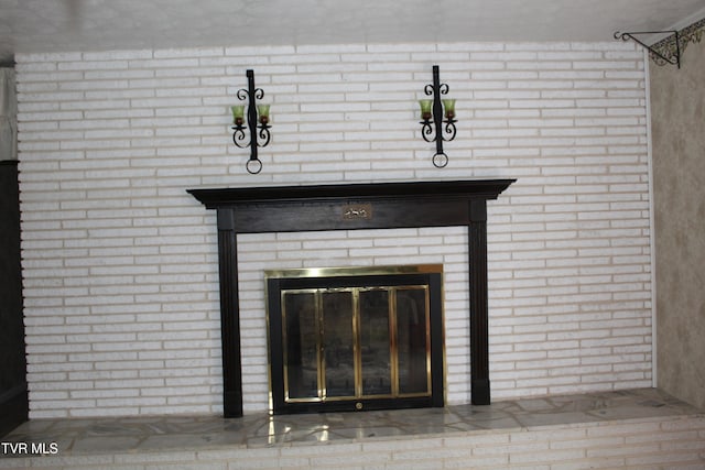 interior details with a fireplace