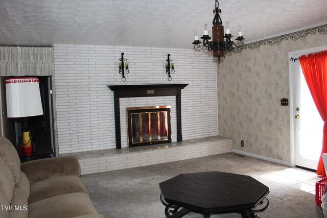 living room featuring a textured ceiling, an inviting chandelier, light carpet, and a brick fireplace