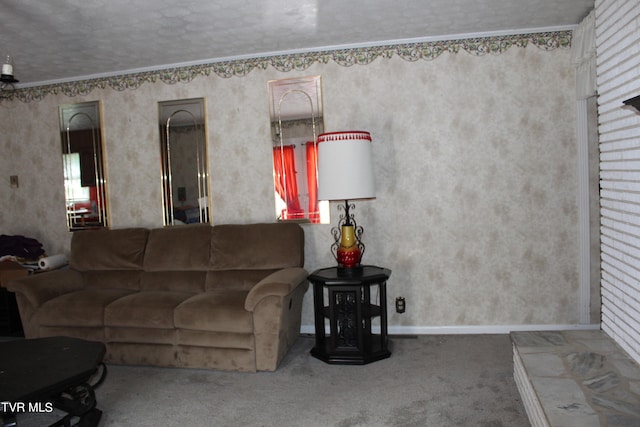 carpeted living room with a textured ceiling and crown molding