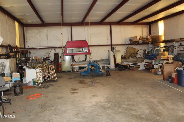 garage with a workshop area