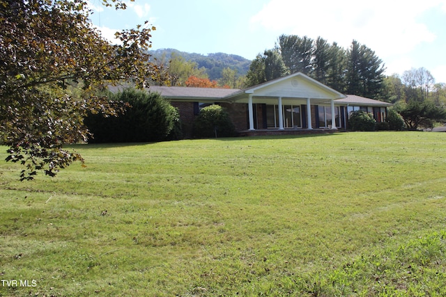 view of front of house with a front yard