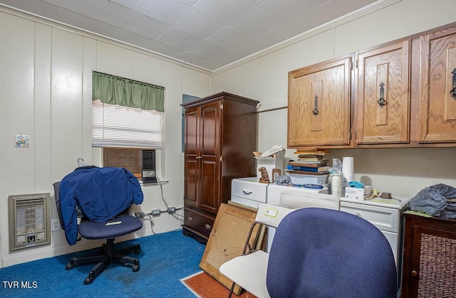 carpeted office featuring ornamental molding and heating unit