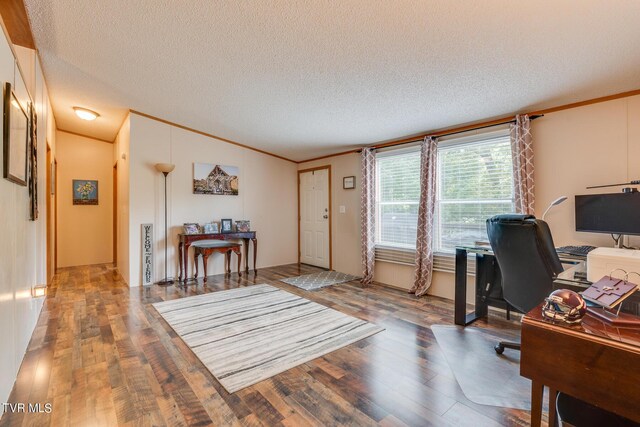 office with a textured ceiling, crown molding, and hardwood / wood-style flooring