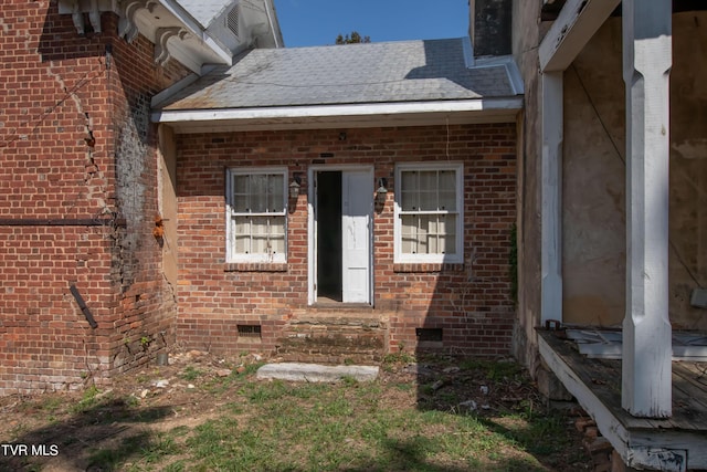 2666 Main St, Surgoinsville, TN 37873 - property entrance with brick siding, crawl space, and a shingled roof
