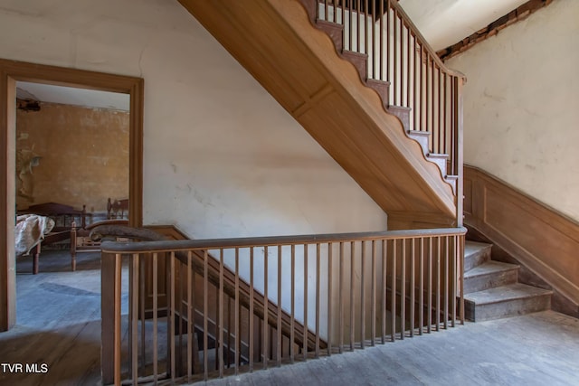 2666 Main St, Surgoinsville, TN 37873 - staircase with a wainscoted wall