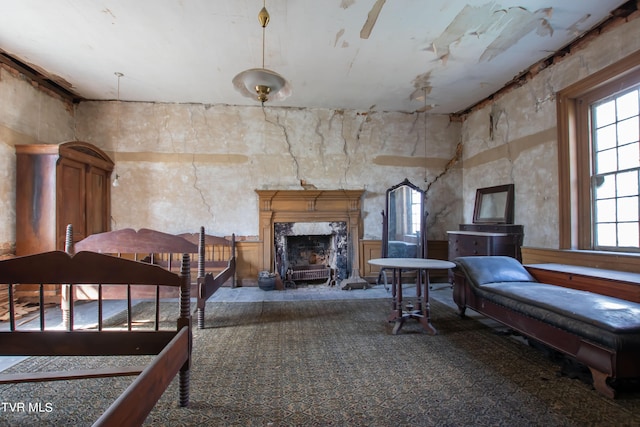 bedroom featuring a fireplace