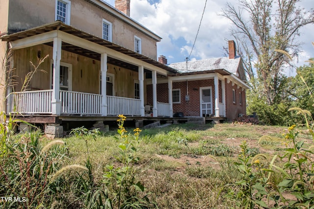 view of home's exterior with a porch