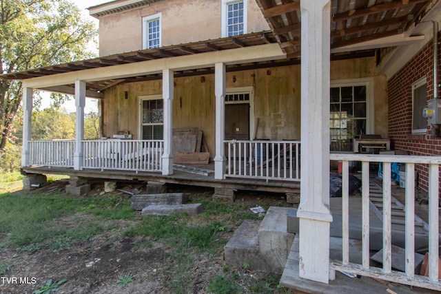 2666 Main St, Surgoinsville, TN 37873 - doorway to property featuring covered porch