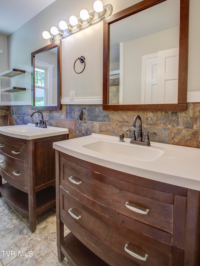 bathroom featuring backsplash and vanity