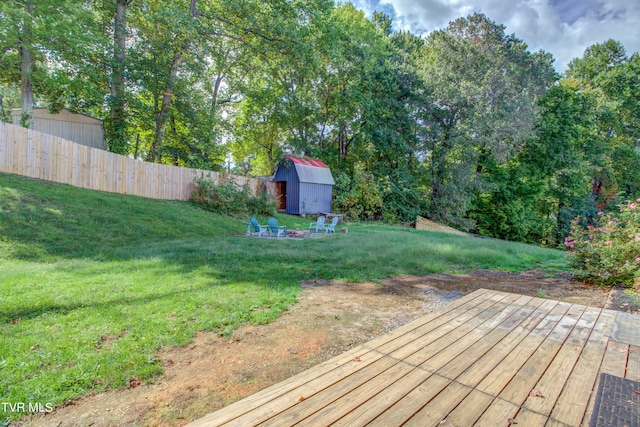 exterior space with a lawn and a storage unit