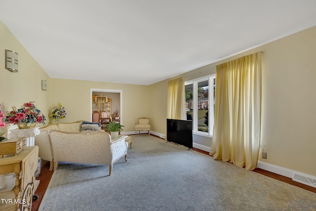 unfurnished living room with lofted ceiling