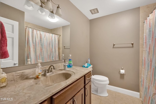 bathroom featuring tile patterned flooring, walk in shower, vanity, and toilet