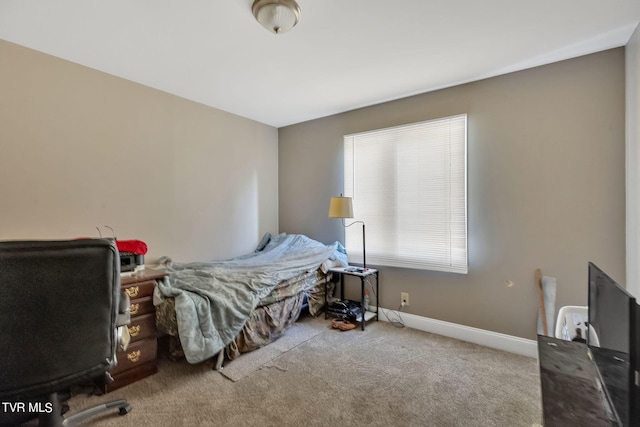 bedroom with light colored carpet