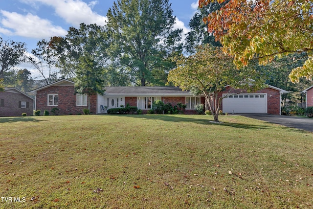 ranch-style house featuring a front yard